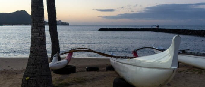 Outrigger canoe along the shore of Kahanamoku Beach in Waikiki