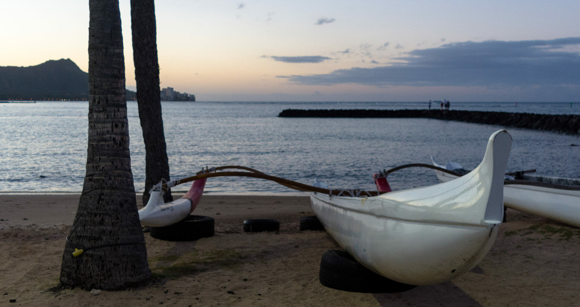 Outrigger canoe along the shore of Kahanamoku Beach in Waikiki