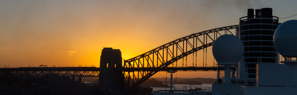 Sydney's Harbor Bay Bridge against the sunset during our departure.