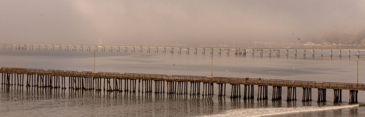 Three piers and  plenty of fog