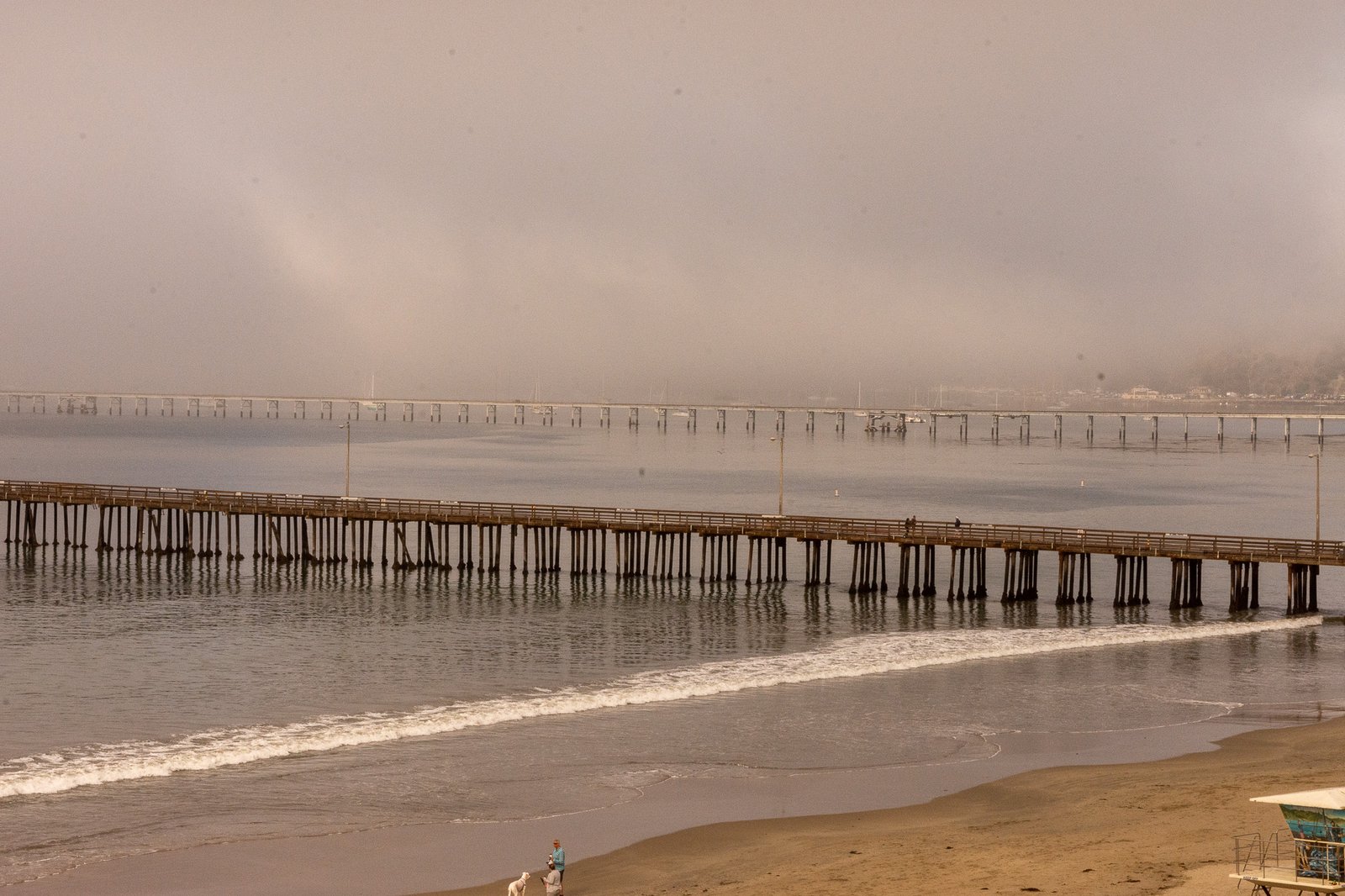 Three piers and  plenty of fog start the morning in Avila Beach